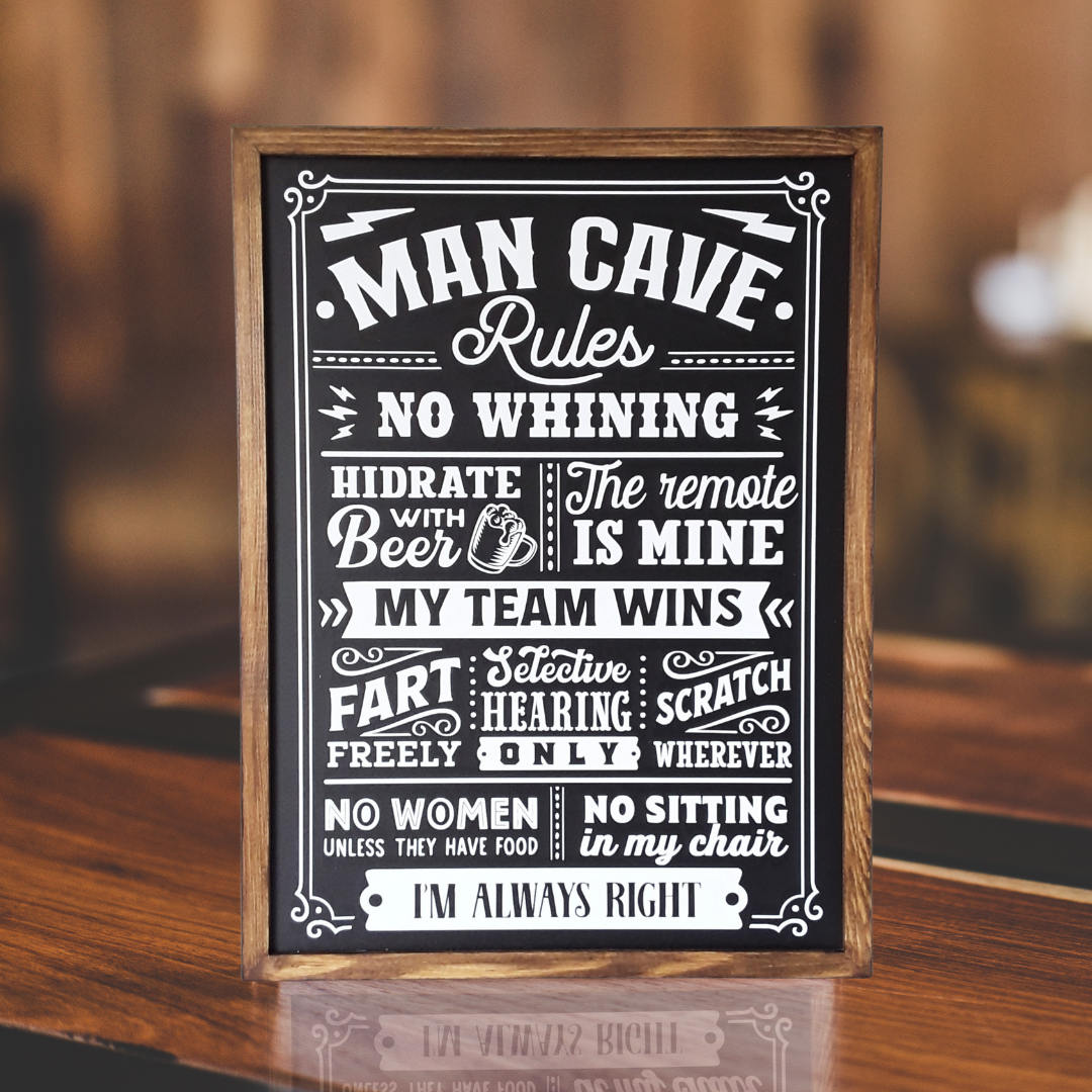 Man Cave Männerhöhle Regeln Dekotafel schwarz weiß Produktfoto auf Bar